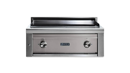 Stono Outdoor Living The Lynx 30” Asado Built-In Grill in Limestone (L30AG-LSNG), featuring two control knobs, a flat grill surface, and backsplash, is displayed against a white background—ideal for luxury outdoor kitchens.
