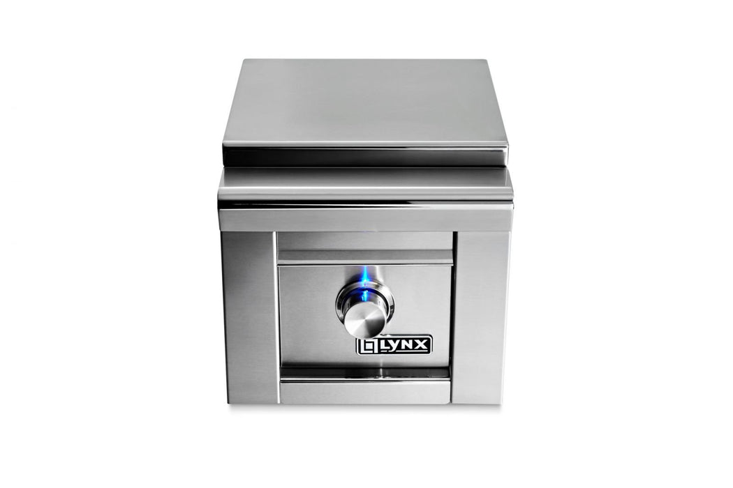 Stono Outdoor Living The Lynx Built-in Single Side Burner (LSB1-3-NG) is a stainless steel outdoor kitchen accessory with a sleek box design, featuring a central control knob illuminated by a blue LED.