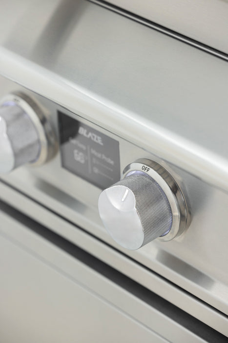 Stono Outdoor Living Close-up of two stainless steel control knobs on the Blaze LTE PRO 32-Inch 4-Burner Built-in Natural Gas Grill (BLZ-4LTEPRO-NG) by Blaze, with a digital temperature screen visible for precise grilling control.
