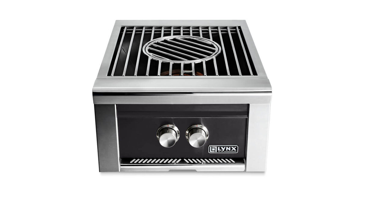 Stono Outdoor Living The Lynx Power Burner in Obsidian (LPB-OBNG) is a stainless steel outdoor grill featuring two control knobs, a rectangular surface with a circular center grate, and the Lynx brand displayed on the front.