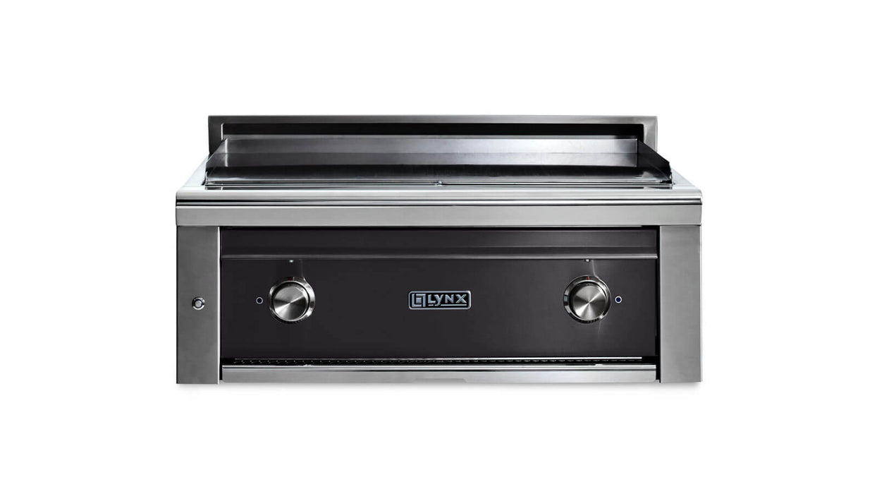 Stono Outdoor Living The Lynx 30” Asado Built-In Grill in Obsidian (L30AG-OBNG) features infrared burners, a black front panel, two control knobs, and the Lynx logo below the griddle—an ideal upgrade for any luxury outdoor kitchen.