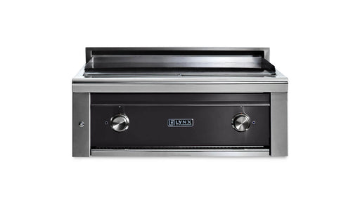 Stono Outdoor Living The Lynx 30” Asado Built-In Grill in Obsidian (L30AG-OBNG) features infrared burners, a black front panel, two control knobs, and the Lynx logo below the griddle—an ideal upgrade for any luxury outdoor kitchen.