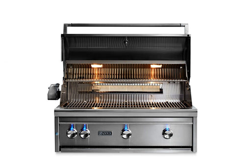 Stono Outdoor Living The Lynx 36" Built-In Grill w/ Rotisserie (L36R-3-NG) in stainless steel features four control knobs, ceramic burners, built-in lights, interior grill grates, and a partially opened hood—all set against a white background.