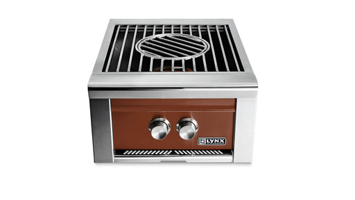 Stono Outdoor Living The Lynx Power Burner in Sierra (LPB-SING) by Lynx features a brown front panel, two control knobs, and a round center grate—making it an ideal addition to any outdoor kitchen. Shown on a white background.