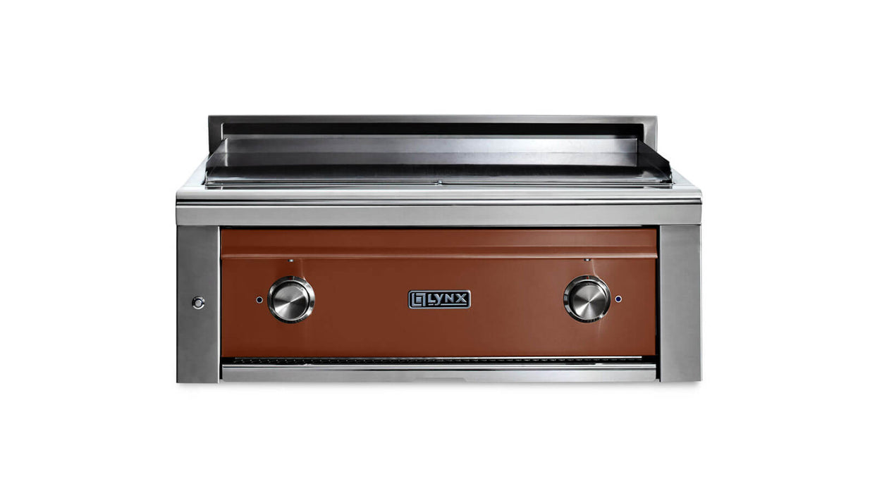 Stono Outdoor Living The Lynx 30” Asado Built-In Grill in Sierra (L30AG-SING) by Lynx features a brown front panel, two control knobs, signature logo, infrared burners, and a flat stainless steel cooking surface—perfect for a luxury outdoor kitchen.