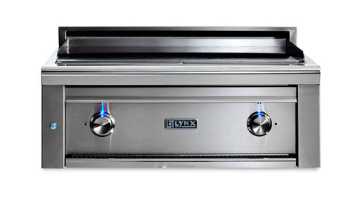Stono Outdoor Living The Lynx 30” Asado Built-In Grill in stainless steel (L30AG-NG) features infrared burners, two illuminated control knobs, and a flat grilling surface—adding elegance to any luxury outdoor kitchen, shown on a white background.