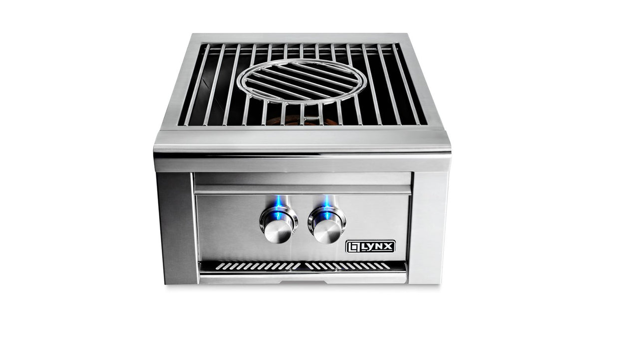 Stono Outdoor Living The Lynx Power Burner in SS (LPB-NG) by Lynx is perfect for outdoor kitchens and features two control knobs with blue lights, a square grate with a circular center, and the Lynx logo on the front panel.