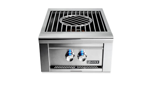 Stono Outdoor Living The Lynx Power Burner in SS (LPB-NG) by Lynx is perfect for outdoor kitchens and features two control knobs with blue lights, a square grate with a circular center, and the Lynx logo on the front panel.