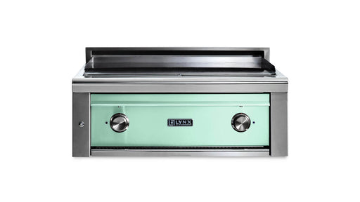 Stono Outdoor Living Front view of the Lynx 30” Asado Built-In Grill in Surf (L30AG-SUNG) with a light green panel, two black control knobs, and Lynx logo—ideal for luxury outdoor kitchens—set against a white background.