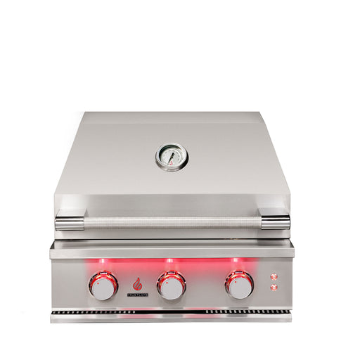 Stono Outdoor Living The TrueFlame 25" 3-Burner Built-In Propane Gas Grill (TF25L) by TrueFlame features commercial-grade stainless steel, three red-lit control knobs, a closed lid, and a built-in temperature gauge centered on the lid.