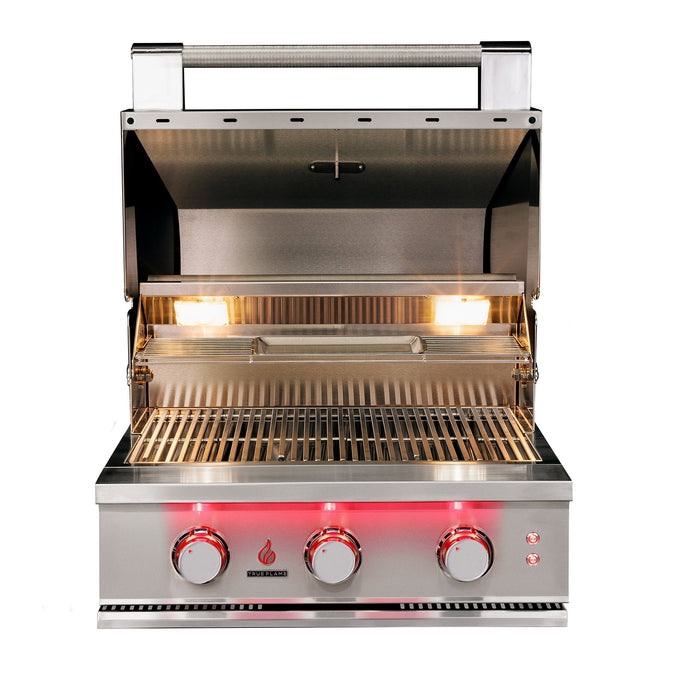 Stono Outdoor Living The TrueFlame 40" 5-Burner Built-In Natural Gas Grill (TF40) by TrueFlame is shown clean and empty, with its lid open, interior lights on, and three red-lit front control knobs against a white background.