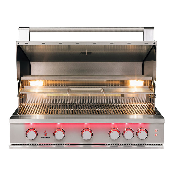 Stono Outdoor Living The TrueFlame 25" 3-Burner Built-In Natural Gas Grill (TF25) features stainless steel construction, three control knobs with red indicators, built-in lights, and an open lid showing the spacious cooking grates.