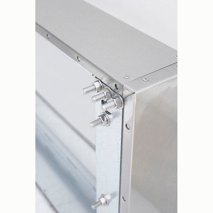 Stono Outdoor Living Close-up of a metallic frame corner with bolts and nuts at the joint, featuring the TrueFlame 8" Spacer Bracket for 36" Outdoor Vent Hood (TF-VH36-2-SP8) with a smooth silver finish and precise, clean edges.