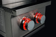 Stono Outdoor Living Close-up of two illuminated metallic control knobs with red indicator lights on the TrueFlame Double Side Burner - TFSB2, a high-performance stainless steel side burner by TrueFlame for outdoor kitchens.