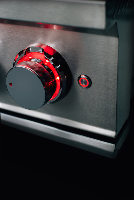 Stono Outdoor Living A close-up of the TrueFlame Gas Double Side Burner - TFSB2L shows a stainless steel finish with a large round control knob, red LED lights, and a circular power button, highlighting the premium design by TrueFlame for outdoor kitchens.