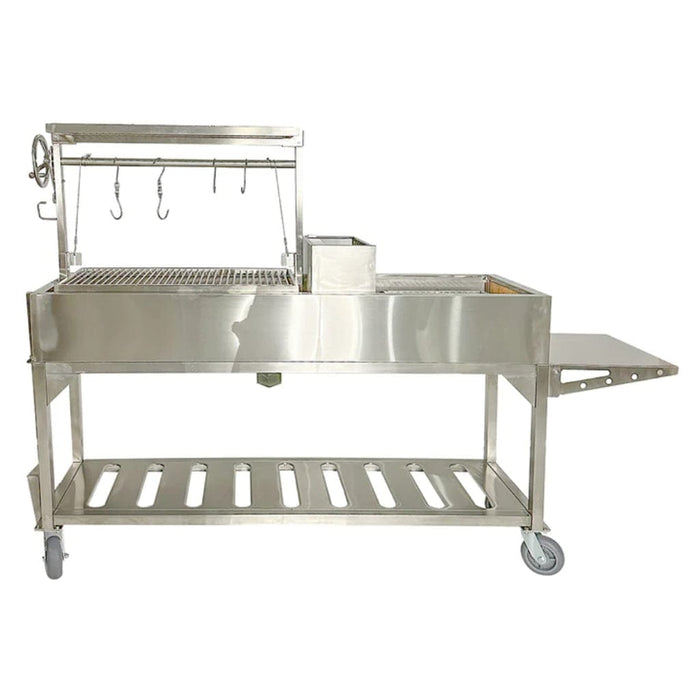 Stono Outdoor Living The Tagwood BBQ Argentine Santa Maria Wood Fire & Charcoal Grill - BBQ06SS by Tagwood BBQ features a large 304 stainless steel build, grilling surface, hanging hooks, side shelf, lower storage rack, and wheels for easy outdoor cooking.