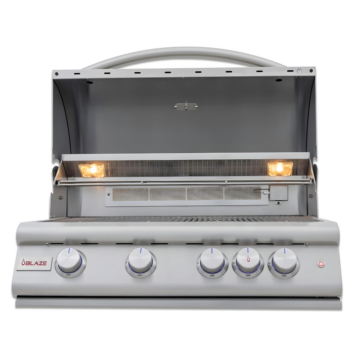 Stono Outdoor Living A front view of the Blaze Premium LTE+ 32" 4-Burner Propane Grill (BLZ-4LTE3-LP) showcases four control knobs, searing rods, two interior lights, and an open lid—built to last with a lifetime warranty.