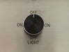 Stono Outdoor Living A black control knob on the Blaze 48-Inch Stainless Steel Vent Hood (BLZ-48-VHOOD) with positions: OFF (top), ON (left/right), OFF LIGHT (bottom). The knob is currently set to OFF.