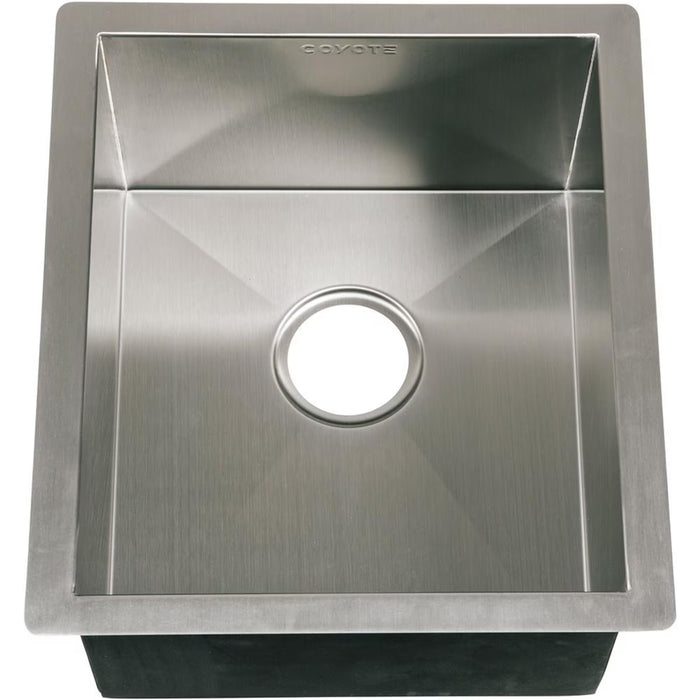 Stono Outdoor Living The Coyote Sink - Universal Mount (C1SINK1618) is a rectangular stainless steel sink with angular sides, centered drain, and brushed finish—perfect for outdoor kitchens. The word COYOTE is engraved on the inner back edge.
