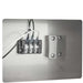 Stono Outdoor Living A close-up of an electrical terminal block with wires and a metal bracket installed inside a stainless steel enclosure for outdoor kitchens, shown in the Coyote Warming Drawer - C3-WD by Coyote.