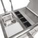 Stono Outdoor Living The Coyote 30" Refreshment Center w/ Sink, Faucet, and DI Cooler (C3RC) features a small sink, commercial faucet, white cutting board, four compartments, and an open refrigerated storage bin—perfect for outdoor kitchens.