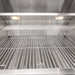Stono Outdoor Living A close-up of the Coyote 30" C-Series Grill (C3C30NG), a clean stainless steel natural gas grill with three burners, dual wire racks, and built-in lights—ideal for any modern outdoor kitchen.