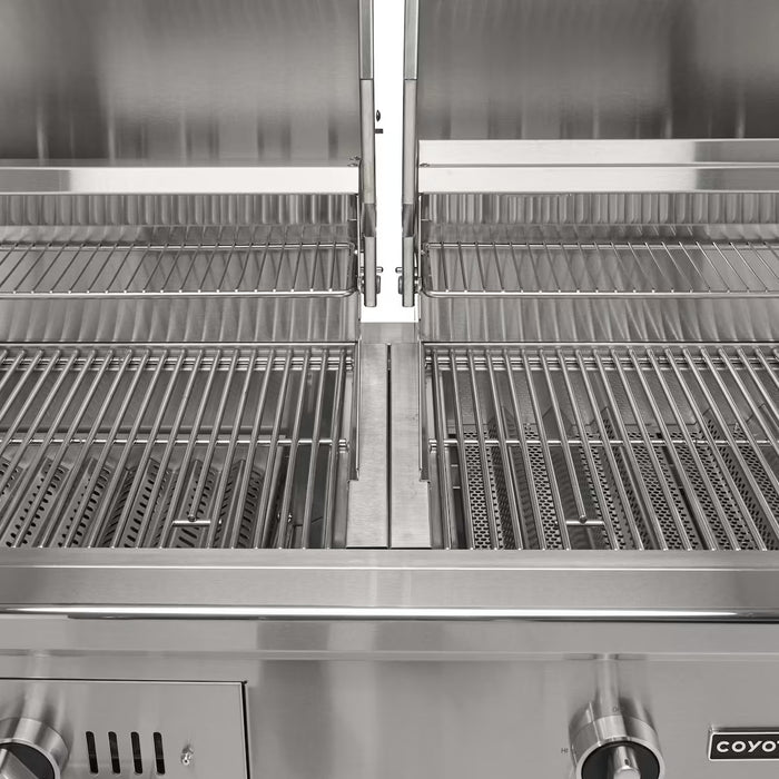 Stono Outdoor Living A close-up of the Coyote 50" Hybrid Grill (C3HY50NG) shows open lids, clean dual grilling racks, burners, control knobs, and part of the brand logo—highlighting its built-in natural gas and charcoal cooking versatility.