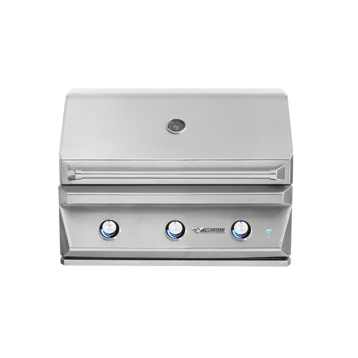 Stono Outdoor Living The Twin Eagles 36-Inch 3-Burner Built-In Propane Gas Grill (TEBQ36G-CL) features a Five-Part Grilling System, blue-lit knobs, stainless steel burners, and a built-in temperature gauge, all set in sleek stainless steel against a white background.