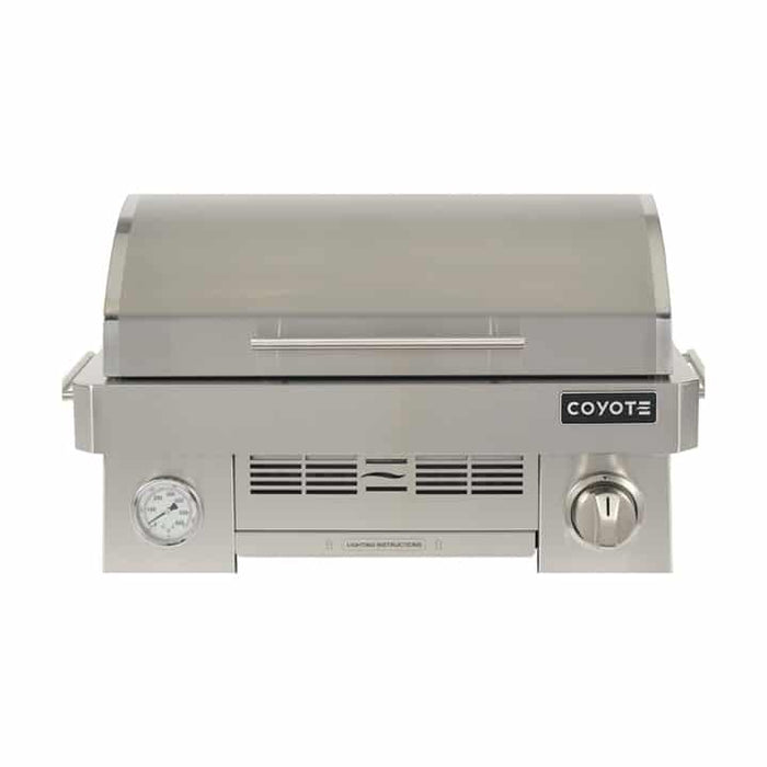 Stono Outdoor Living The Coyote 25" Portable Grill, 1 Burner, Ceramic (C1PORTLP) is made from marine-grade stainless steel and features a closed lid, front temperature gauge, control knob, and vent—all shown on a plain white background.