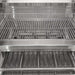 Stono Outdoor Living Close-up of the Coyote 36" Charcoal Grill (C3CH36), a stainless steel built-in model with three adjustable cooking racks and a V-shaped drip tray on the bottom rack—ideal for outdoor grilling.