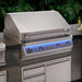 Stono Outdoor Living A modern outdoor kitchen features the Twin Eagles Eagle One 42-Inch 3-Burner Built-In Natural Gas Grill with Sear Zone & Infrared Rotisserie Burner, set against lush green tropical leaves.