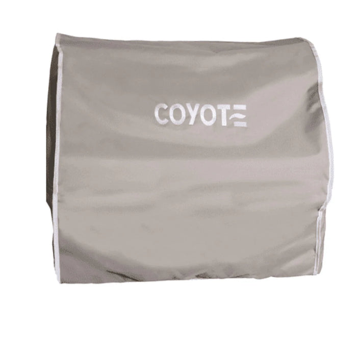 Stono Outdoor Living The Coyote Cover for 36" Built-In Pellet Grill (Gray - CCVR36P-BIG) is a light gray, weather-resistant cover with white COYOTE branding and white piping—ideal for protecting your outdoor appliance.