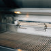 Stono Outdoor Living Close-up of the American Made Grills Estate 30-Inch Grill (Natural Gas, EST30-NG) by American Made Grills, featuring a stainless steel grill with rotisserie attachment, open lid, and interior light to showcase its premium features.