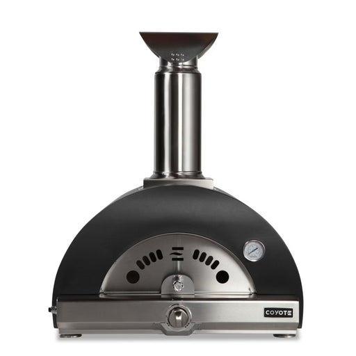Stono Outdoor Living Front view of the Coyote 30" Hybrid Multi-Fuel Outdoor Oven in Matte Black (C1PZ30HMBLP), featuring a chimney, built-in thermometer, vents, and a curved door with handle—ideal for wood-fired flavor in your outdoor kitchen.