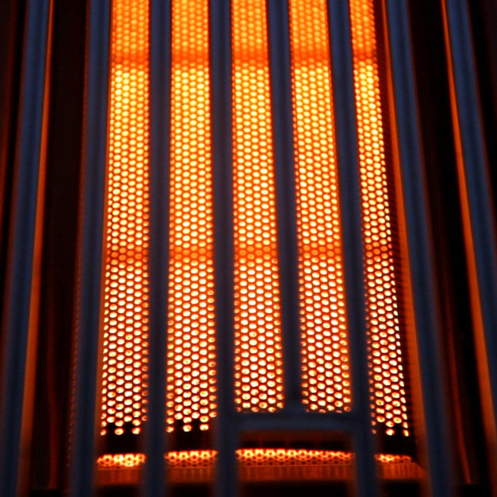 Stono Outdoor Living Close-up of the Blaze Grills Infrared Searing Burner (BLZ-IRN) for Blaze and Blaze LTE grills—its glowing orange elements behind a metal grid create striking lines, ideal for achieving steakhouse-quality sear marks.