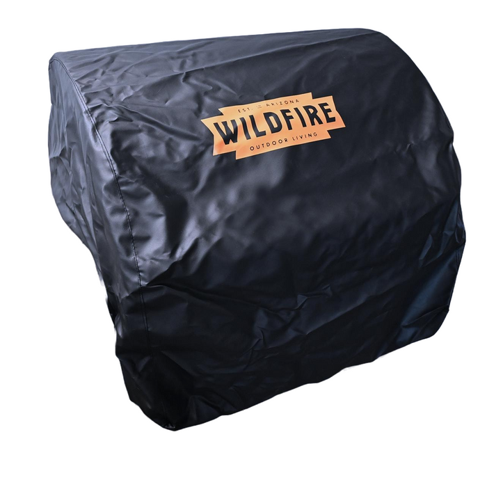 Stono Outdoor Living The Wildfire 30” Vinyl Griddle Cover (WFGRDC30) by Wildfire Outdoor Living, featuring the brand's orange logo, is shown in black over a grill against a white background.