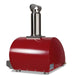 Stono Outdoor Living The Coyote 30" Hybrid Multi-Fuel Outdoor Oven in Red (C1PZ30HRLP) features a dome design, shiny stainless steel chimney, and four sturdy legs—perfect for adding wood-fired flavor to your outdoor kitchen.
