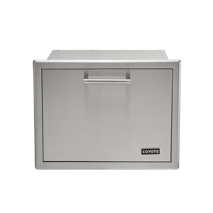 Stono Outdoor Living The Coyote 26" Pull Out Ice Chest (C3-CPOC) is a stainless steel outdoor kitchen drawer with a handle, built-in ice storage, and the Coyote logo on the bottom right corner.