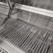 Stono Outdoor Living Close-up of the Coyote 50" Hybrid Grill (C3HY50NG), a built-in stainless steel grill with clean grates and metal backsplash, ready for cooking with charcoal or natural gas.