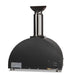 Stono Outdoor Living The Coyote 30" Hybrid Multi-Fuel Outdoor Oven in Matte Black (C1PZ30HMBLP) features a rounded top, stainless steel chimney, adjustable metal feet, and a gas connection—perfect for wood-fired flavor in your outdoor kitchen.