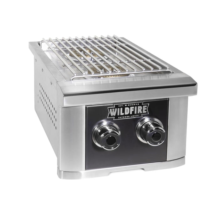 Stono Outdoor Living The Wildfire Outdoor Living Ranch Pro Double Side Burner 304 Black SS Propane features two front control knobs, a top grilling grate, and Wildfire branding—ideal for your outdoor kitchen setup.