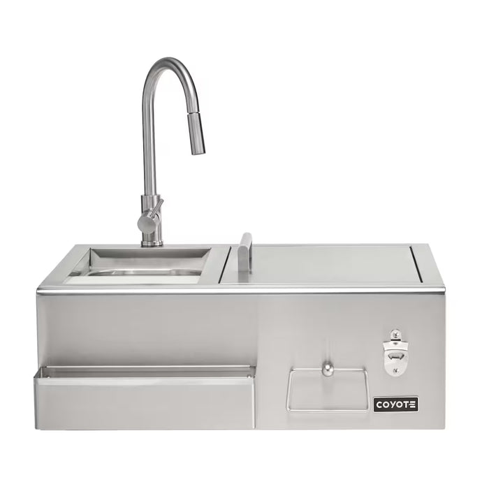 Stono Outdoor Living The Coyote 30" Refreshment Center w/ Sink, Faucet, and DI Cooler (C3RC) boasts a tall faucet, built-in sink, covered compartment, paper towel holder, bottle opener & drawer—an essential outdoor kitchen station proudly displaying the Coyote logo.