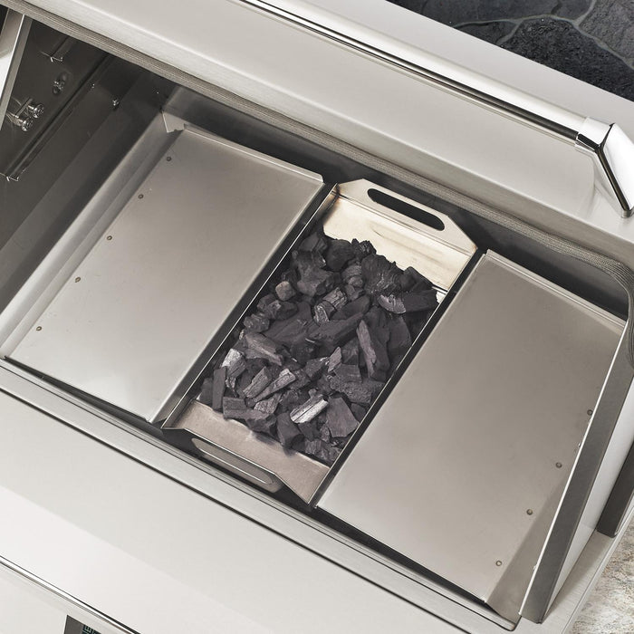 Stono Outdoor Living Top-down view of the Twin Eagles Wi-Fi Controlled 36-Inch Built-In Stainless Steel Pellet Grill and Smoker (TEPG36G) with a charcoal tray, black charcoal in the center, and empty metal trays—ideal for outdoor cooking enthusiasts.