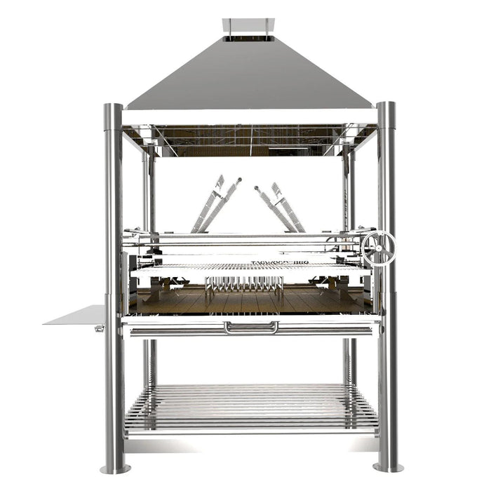 Stono Outdoor Living The Tagwood BBQ XL Argentine Stainless Steel Wood Fire & Charcoal Grill (BBQ22SS) features a chimney hood, adjustable grate with crank wheel, side shelf, and lower storage rack—ideal for wood & charcoal grilling.