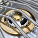 Stono Outdoor Living Close-up of the Coyote 12" Double Side Burner in Natural Gas (C3DBNG), featuring stainless steel construction and silver metal grates, reflecting light in a clean, modern kitchen—perfect for outdoor kitchens.