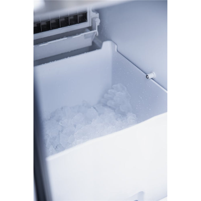 Stono Outdoor Living Close-up of the TrueFlame 15" Outdoor Rated Ice Maker (AMD-IM-15) interior, featuring a white bin partially filled with ice cubes.